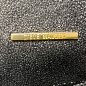 Black and gold hand bag